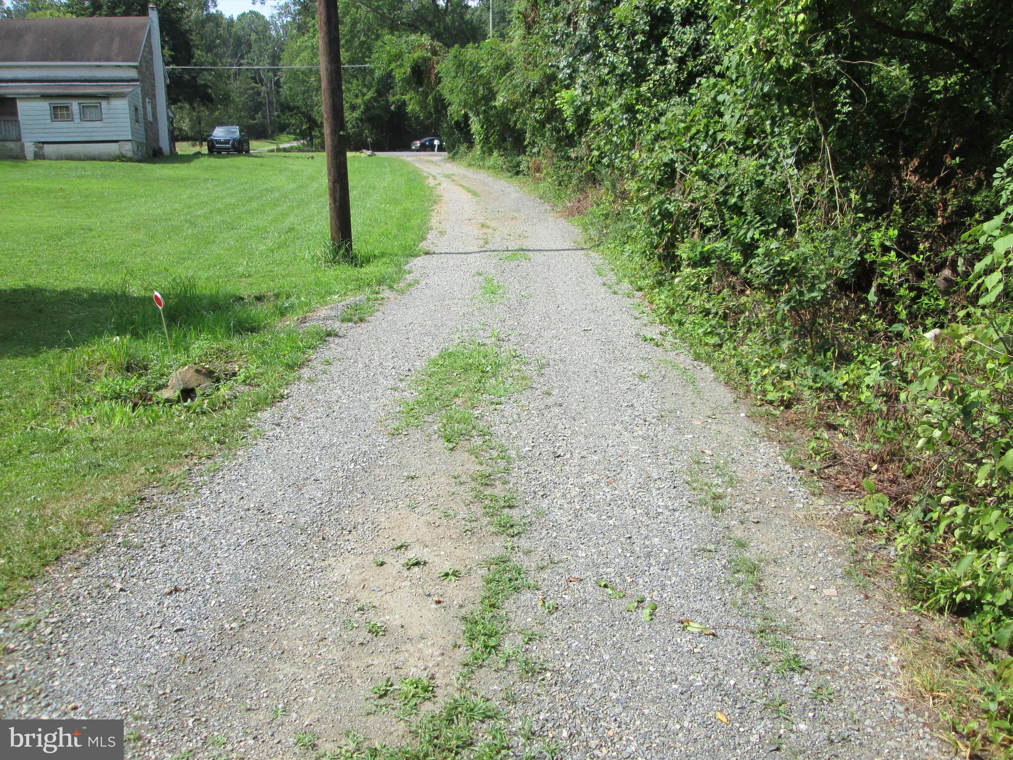 0 Woodchoppertown Road Boyertown, PA 19512 - Photo 5 of 5 a view of a yard with plants and a fountain