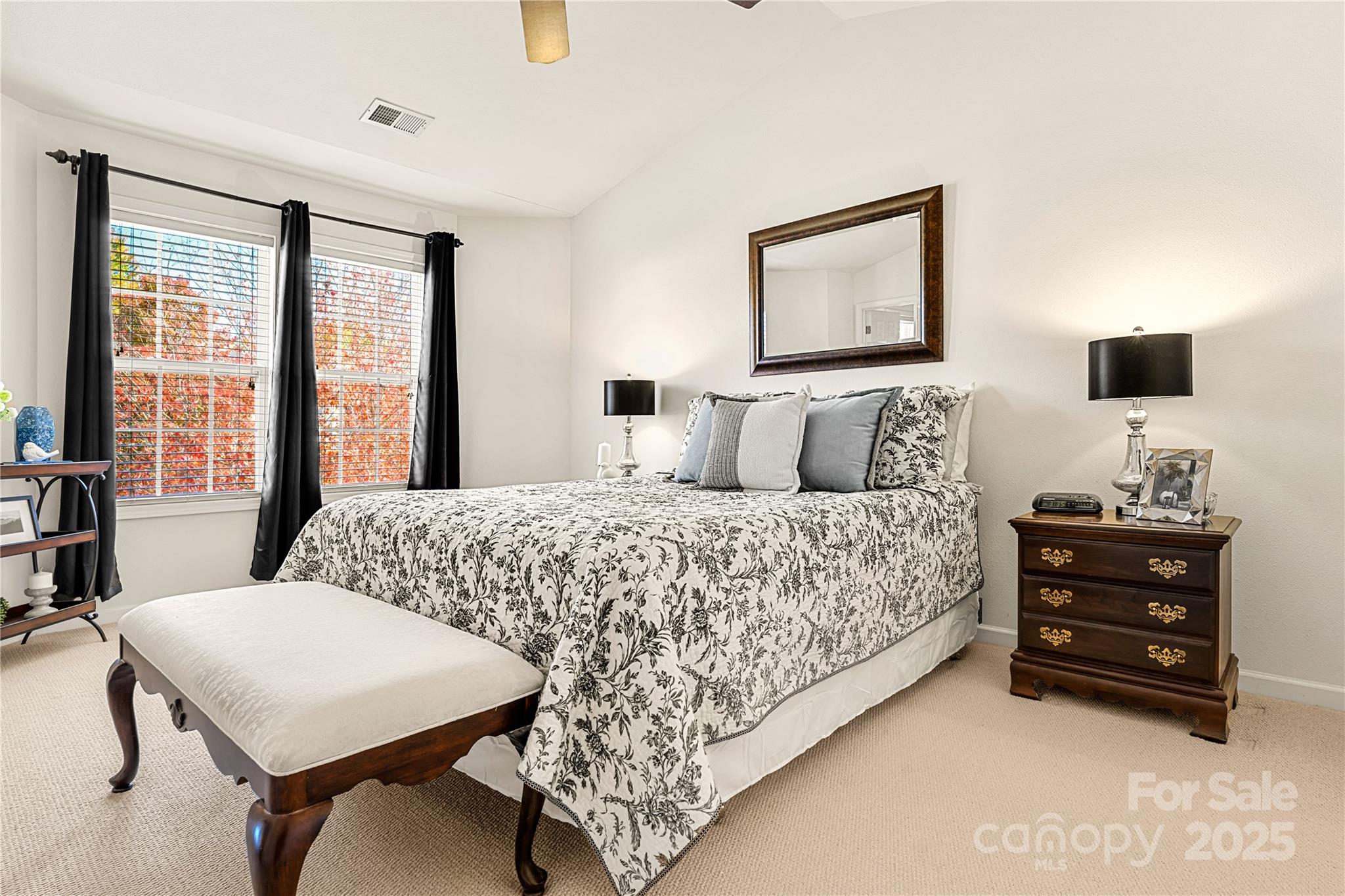 2443 Redmayne Lane Fort Mill, SC 29707 - Photo 19 of 43 a bedroom with a bed and a flat screen tv