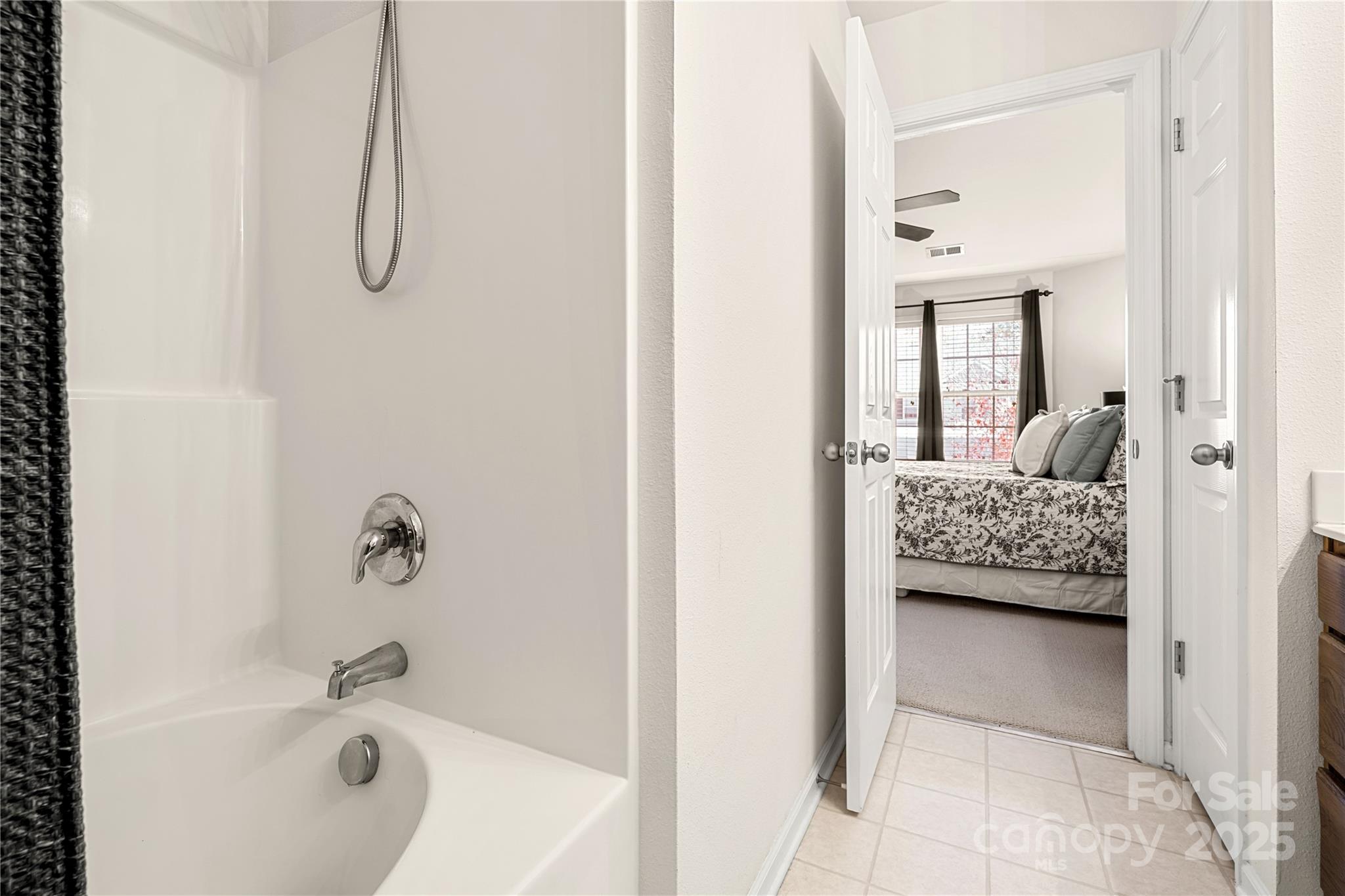 2443 Redmayne Lane Fort Mill, SC 29707 - Photo 23 of 43 a en suite bathroom with a sink and a bathtub