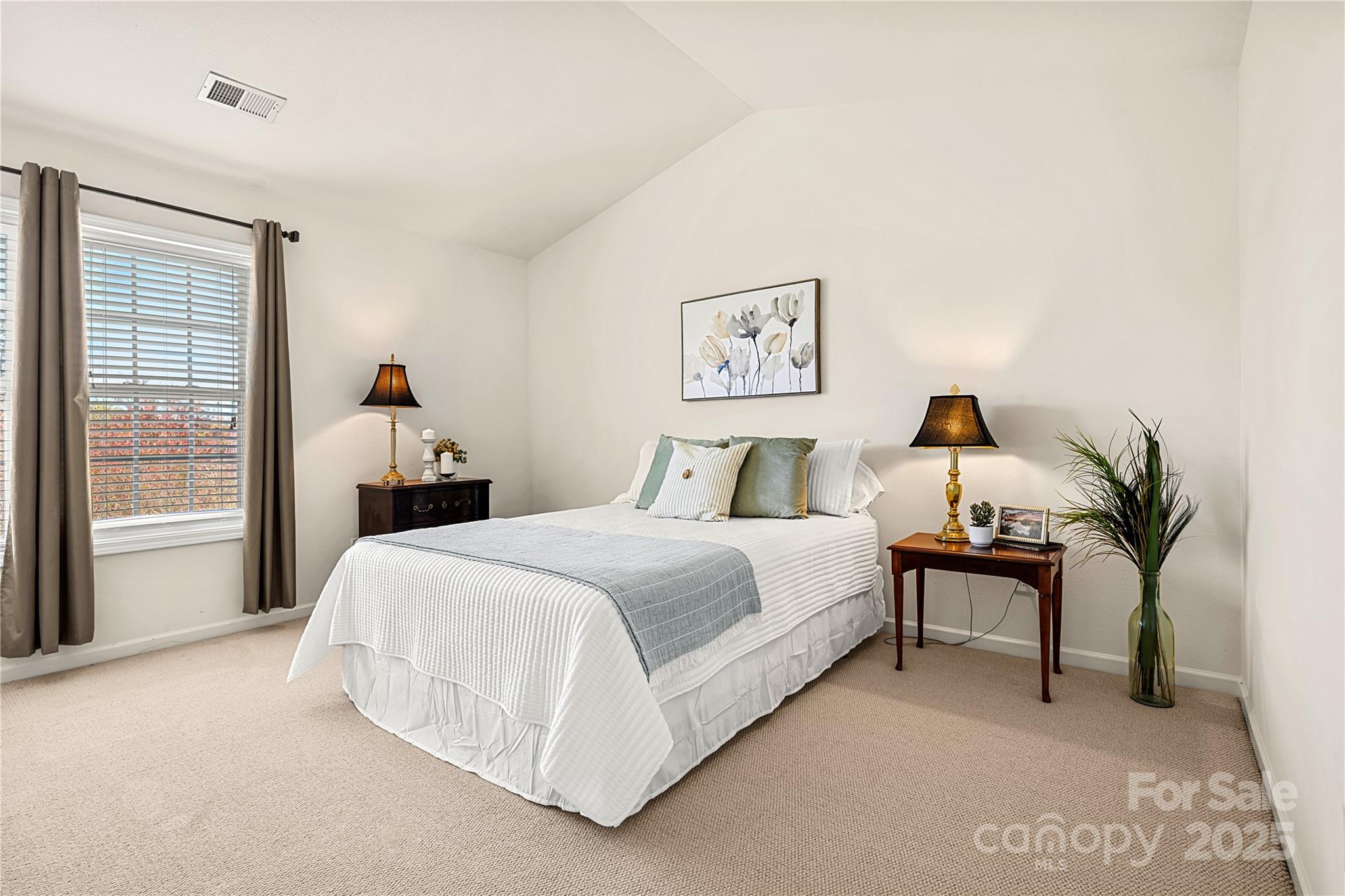 2443 Redmayne Lane Fort Mill, SC 29707 - Photo 25 of 43 a bedroom with a bed and a painting on the wall