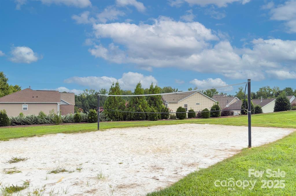 2443 Redmayne Lane Fort Mill, SC 29707 - Photo 42 of 43 a view of a house with a big yard and large trees
