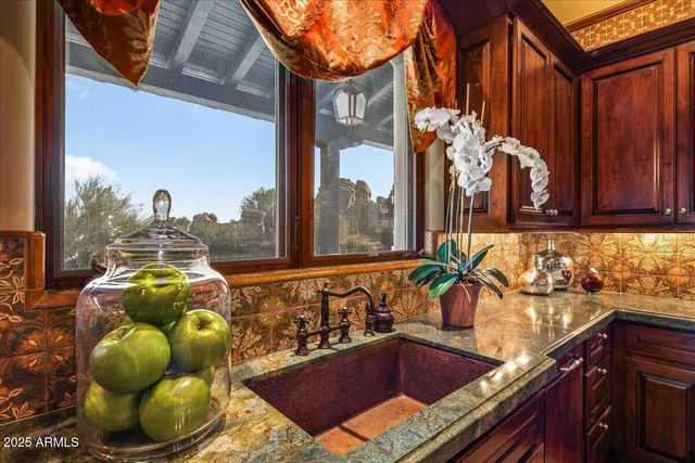 a bed room with a bed and a chair