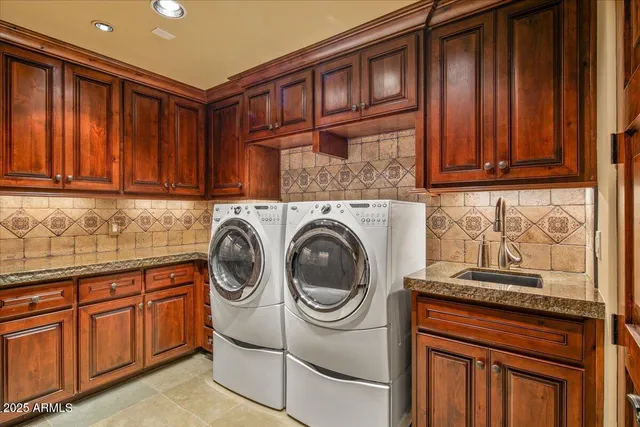 a view of a patio with a table and chairs under an umbrella with a patio