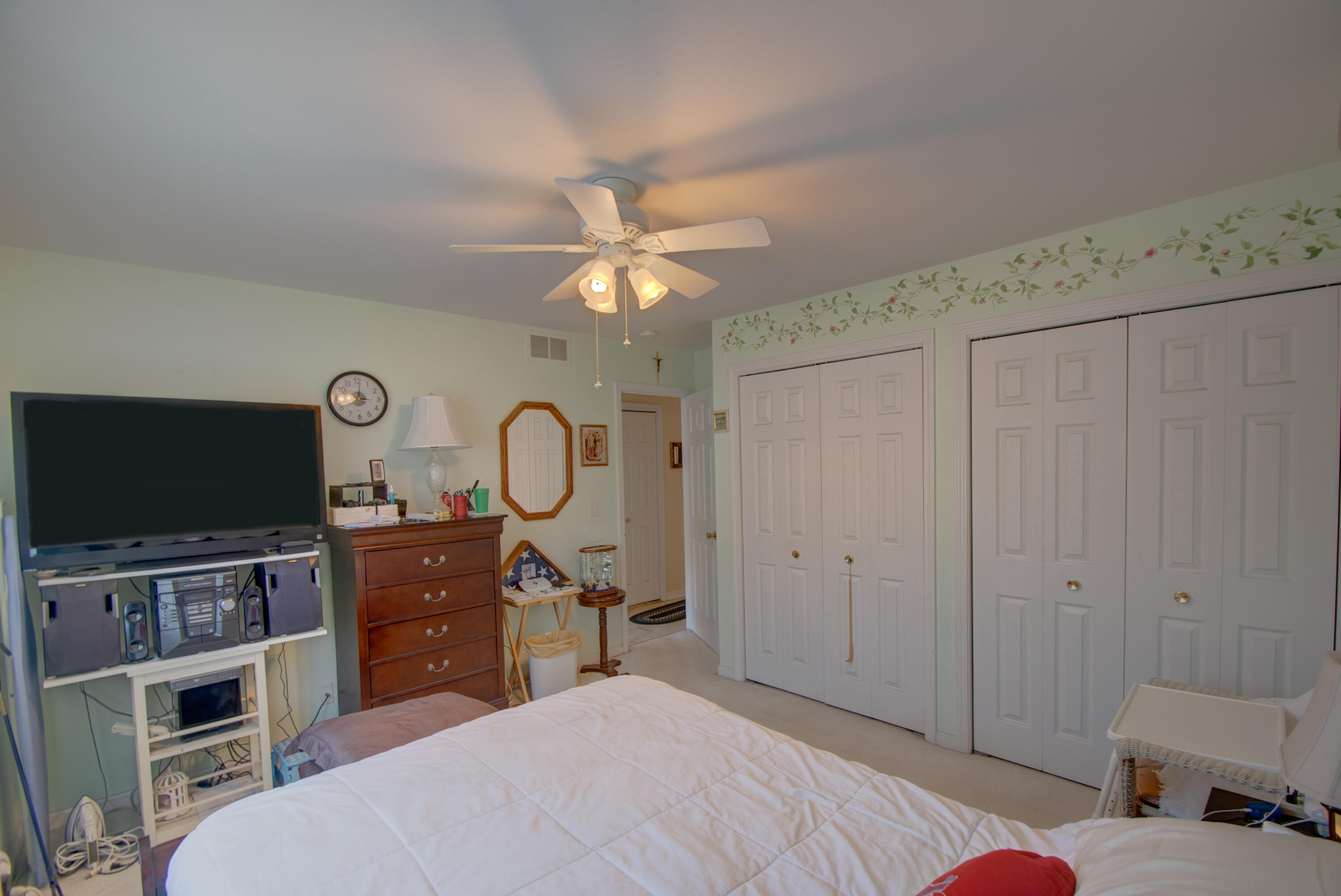 337 Pine Ridge Circle Lowell, IN 46356 - Photo 12 of 26 a bedroom with a bed and a flat screen tv