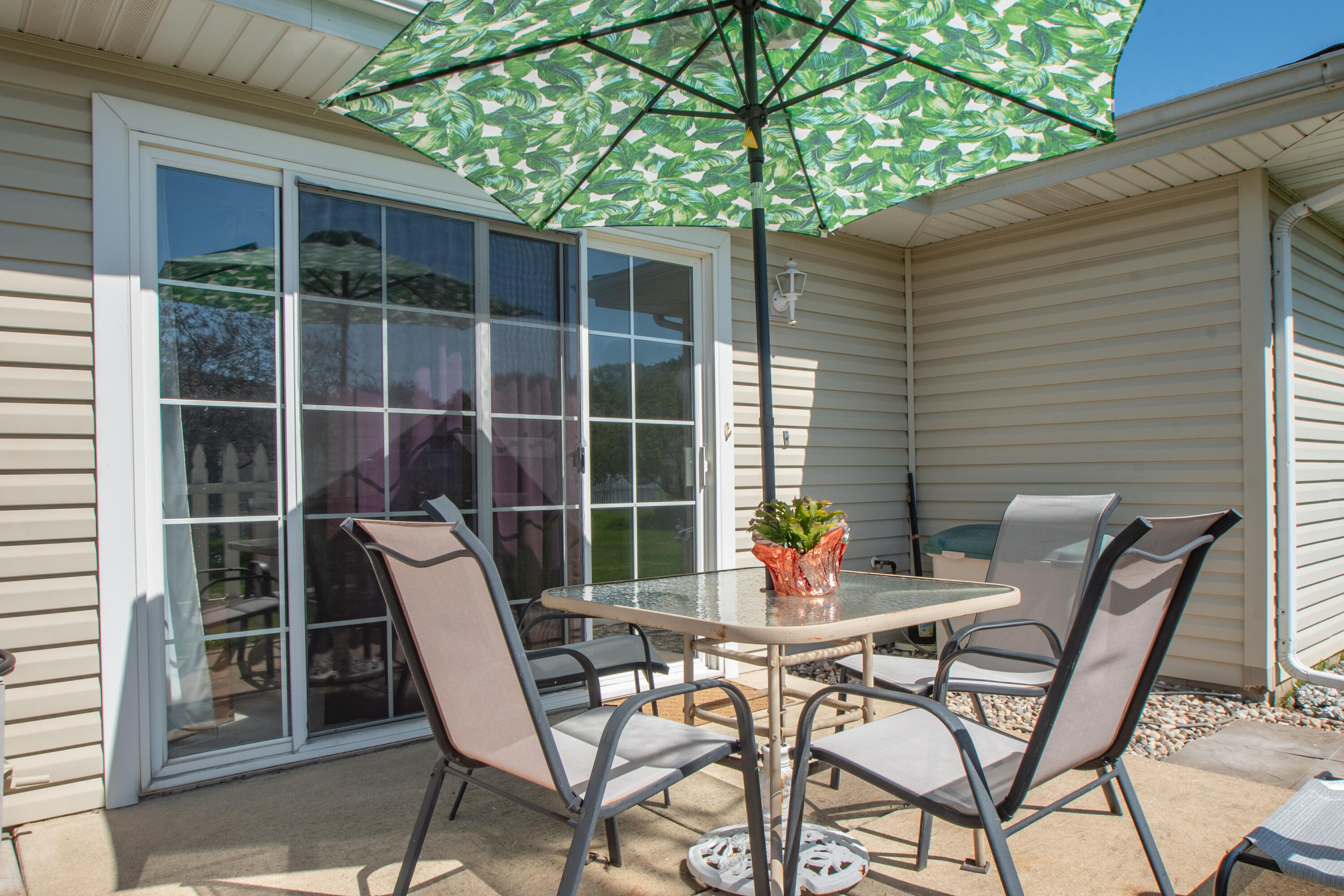 337 Pine Ridge Circle Lowell, IN 46356 - Photo 20 of 26 a patio with table and chairs