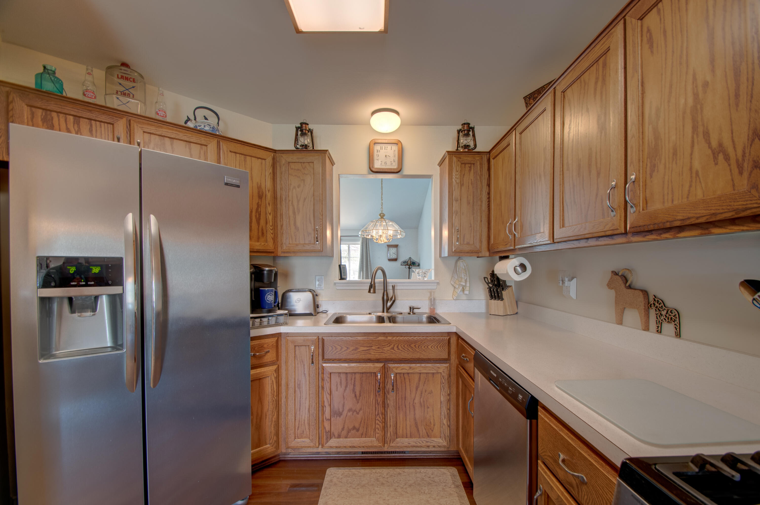337 Pine Ridge Circle Lowell, IN 46356 - Photo 2 of 26 a kitchen with stainless steel appliances a refrigerator sink and cabinets