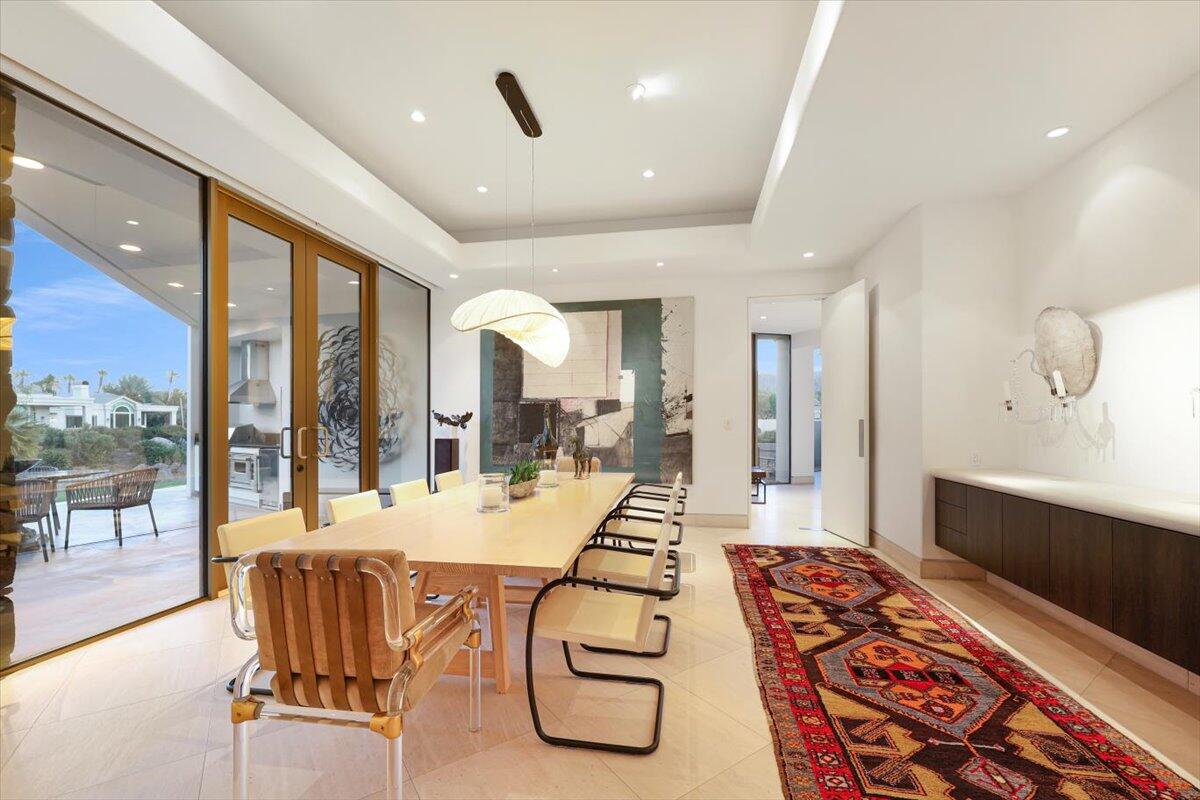102 Waterford Circle Rancho Mirage, CA 92270 - Photo 11 of 44 a very nice looking dining room with a large window and a table