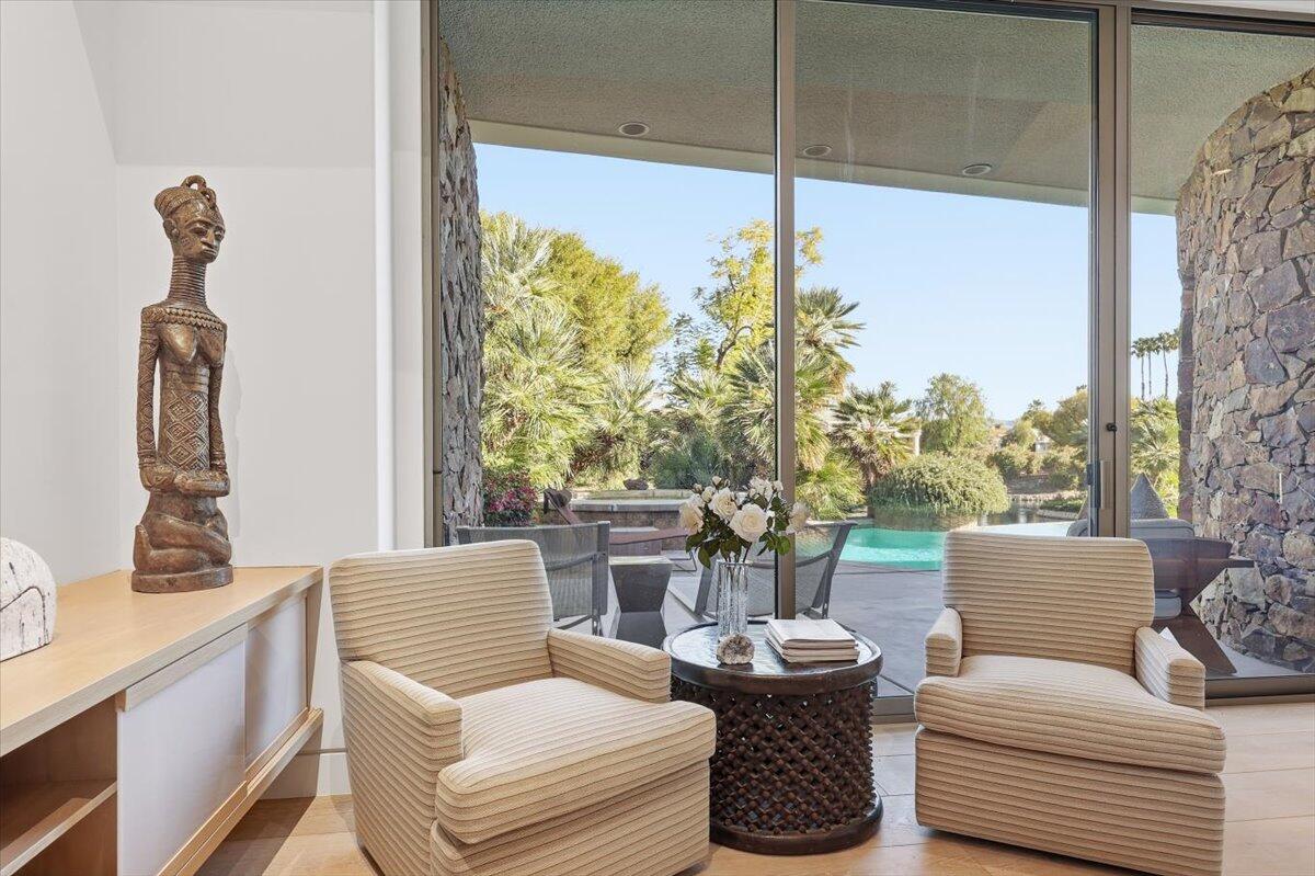 102 Waterford Circle Rancho Mirage, CA 92270 - Photo 22 of 44 a living room with furniture and a window