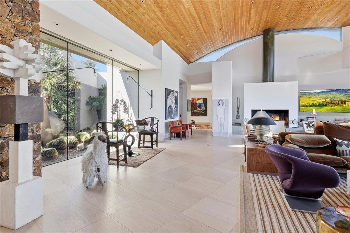 102 Waterford Circle Rancho Mirage, CA 92270 - Photo 6 of 44 a living room with furniture and a table