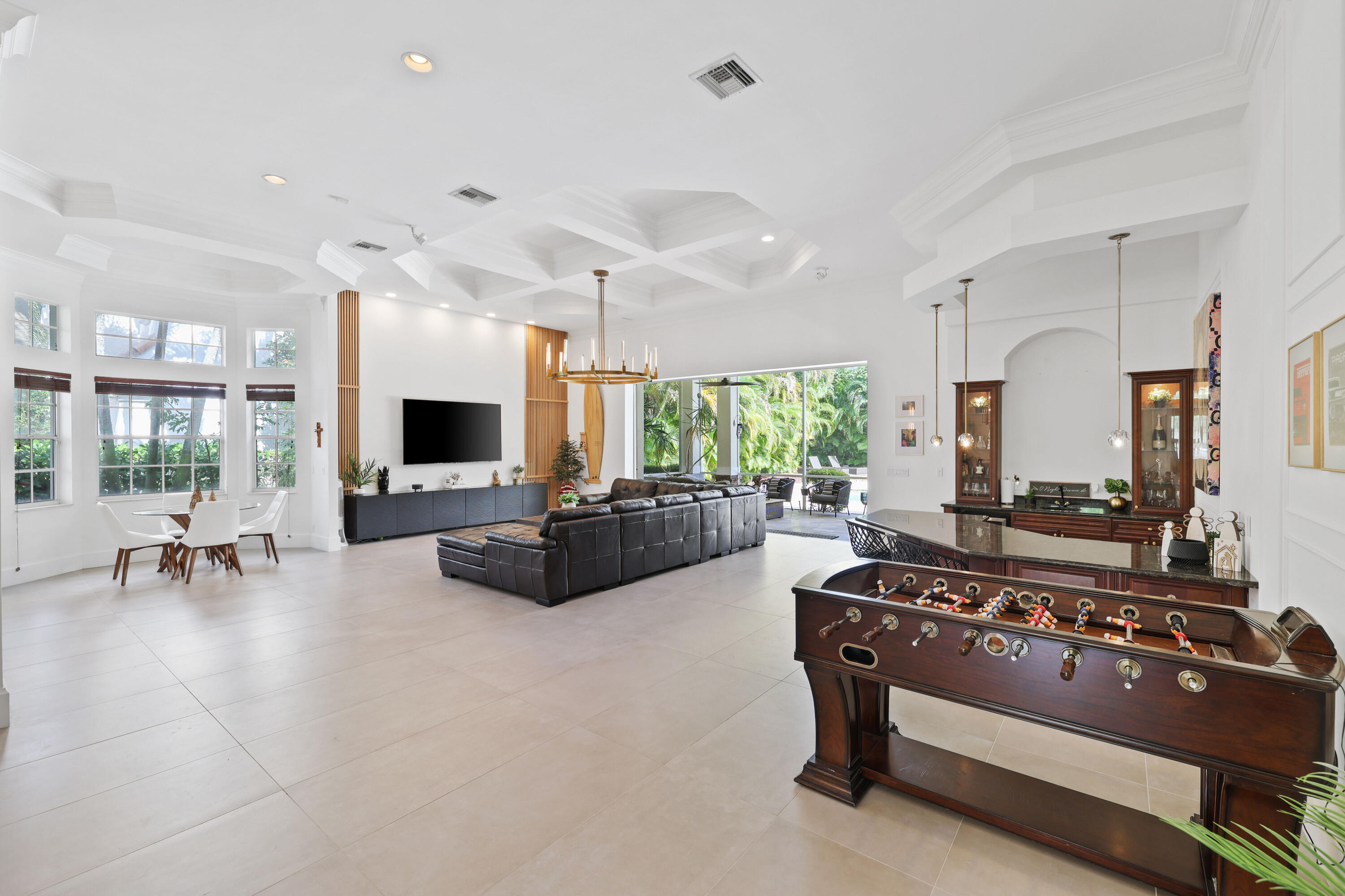 562 Rookery Place Jupiter, FL 33458 - Photo 11 of 72 a living room with furniture and a flat screen tv
