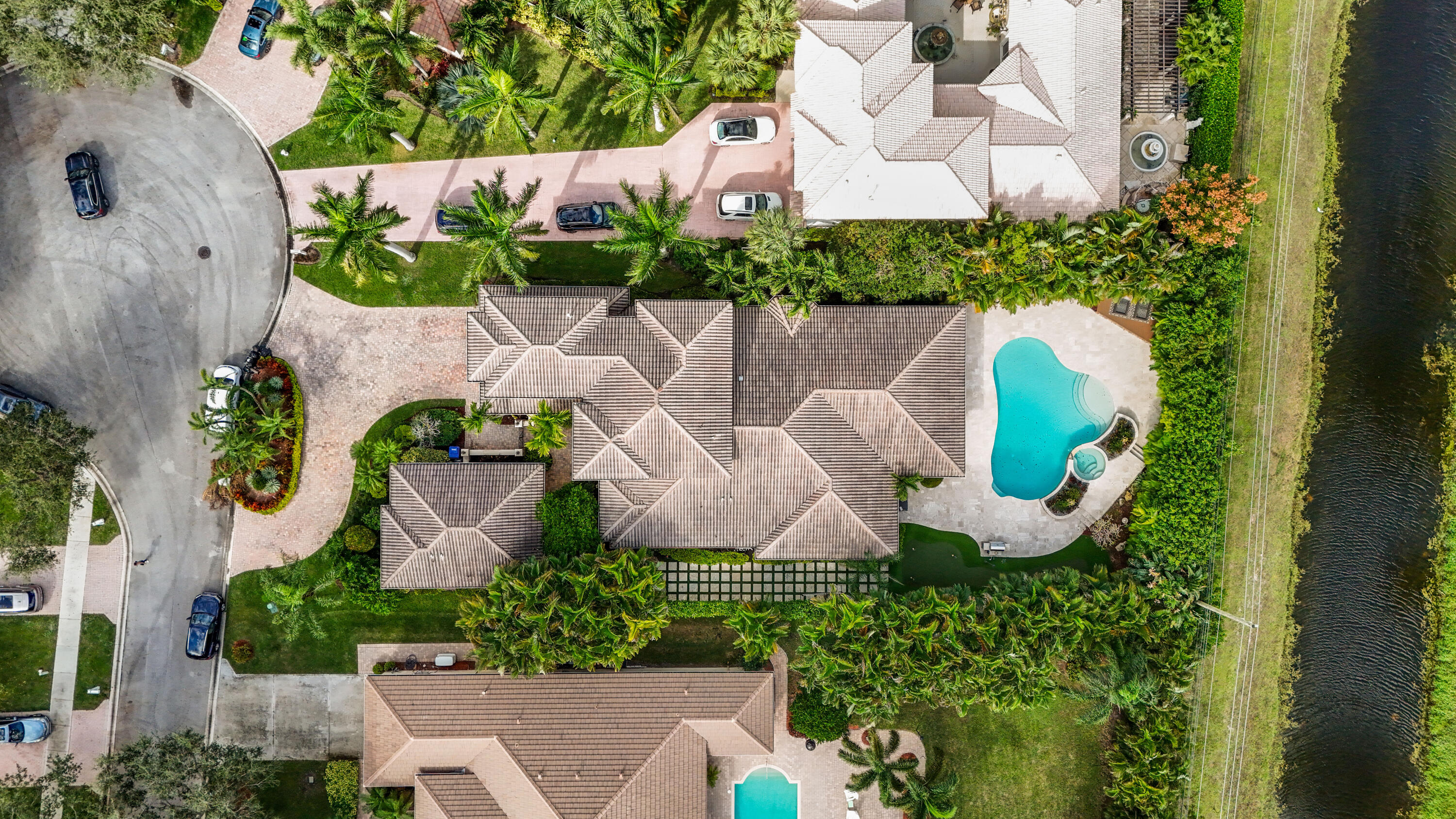 562 Rookery Place Jupiter, FL 33458 - Photo 2 of 72 an aerial view of a house with outdoor space and a garden