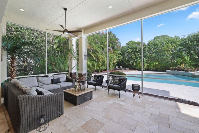 a view of a house with swimming pool