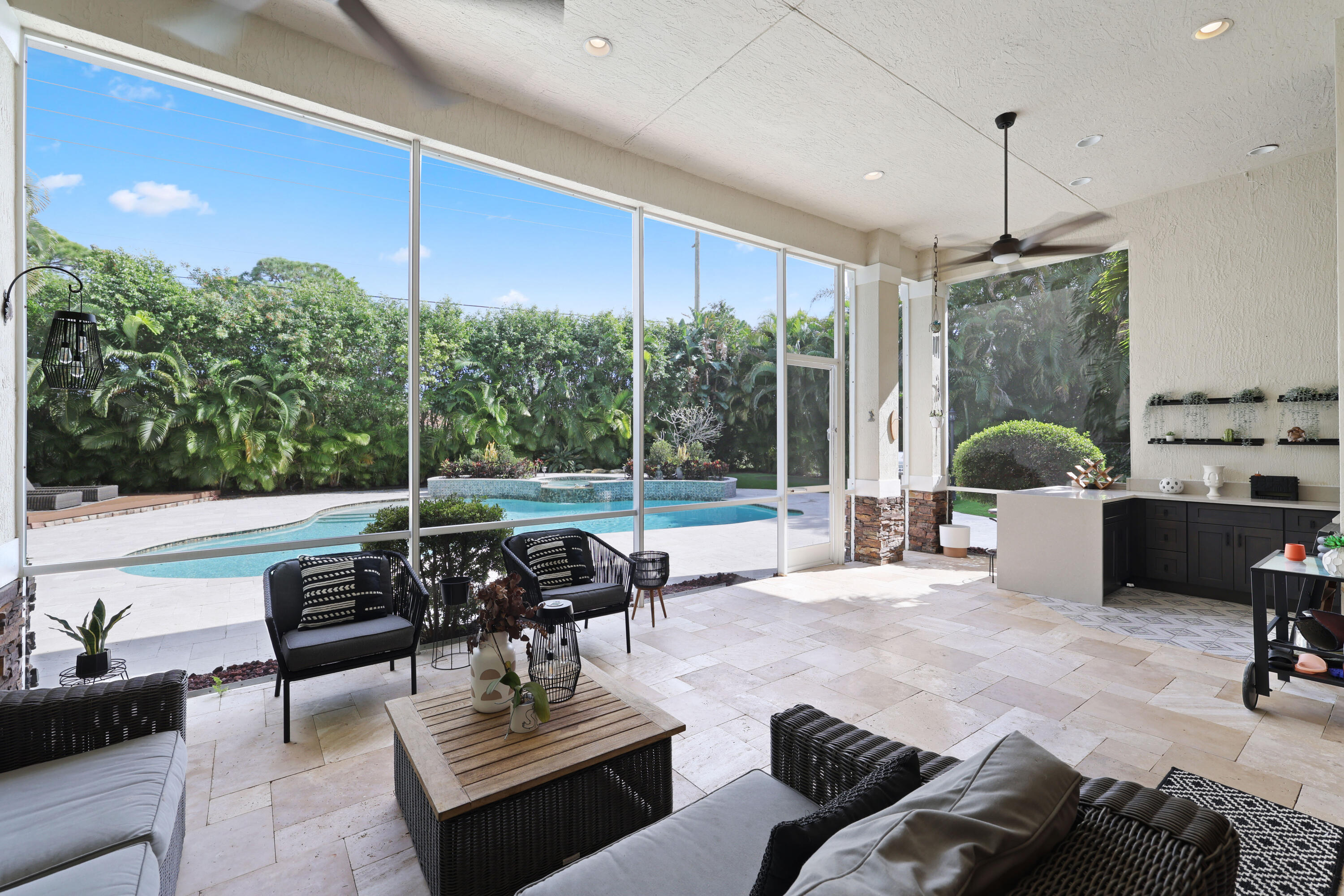 562 Rookery Place Jupiter, FL 33458 - Photo 24 of 72 a living room with furniture and a large window