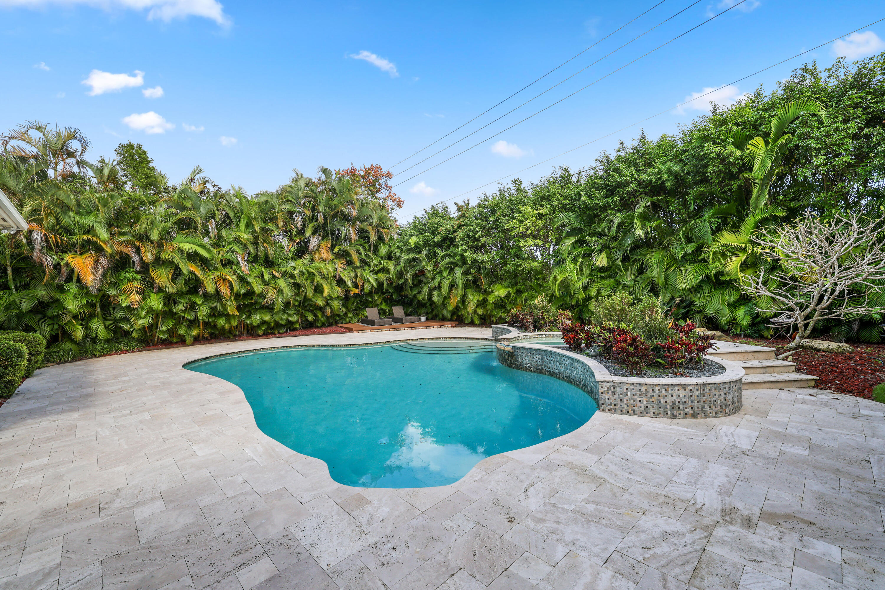 562 Rookery Place Jupiter, FL 33458 - Photo 30 of 72 a view of a swimming pool with a patio