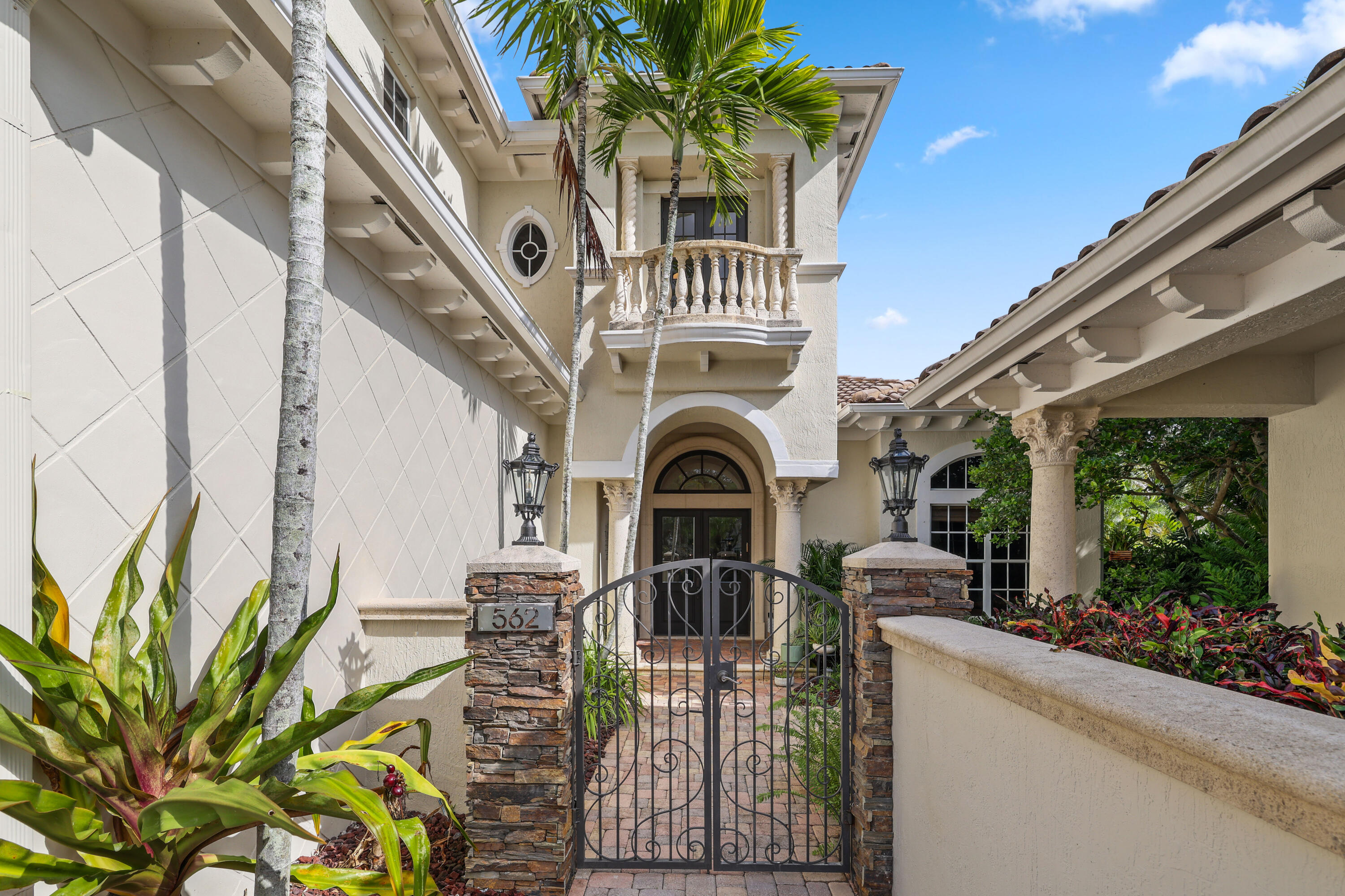 562 Rookery Place Jupiter, FL 33458 - Photo 3 of 72 a view of front door of house