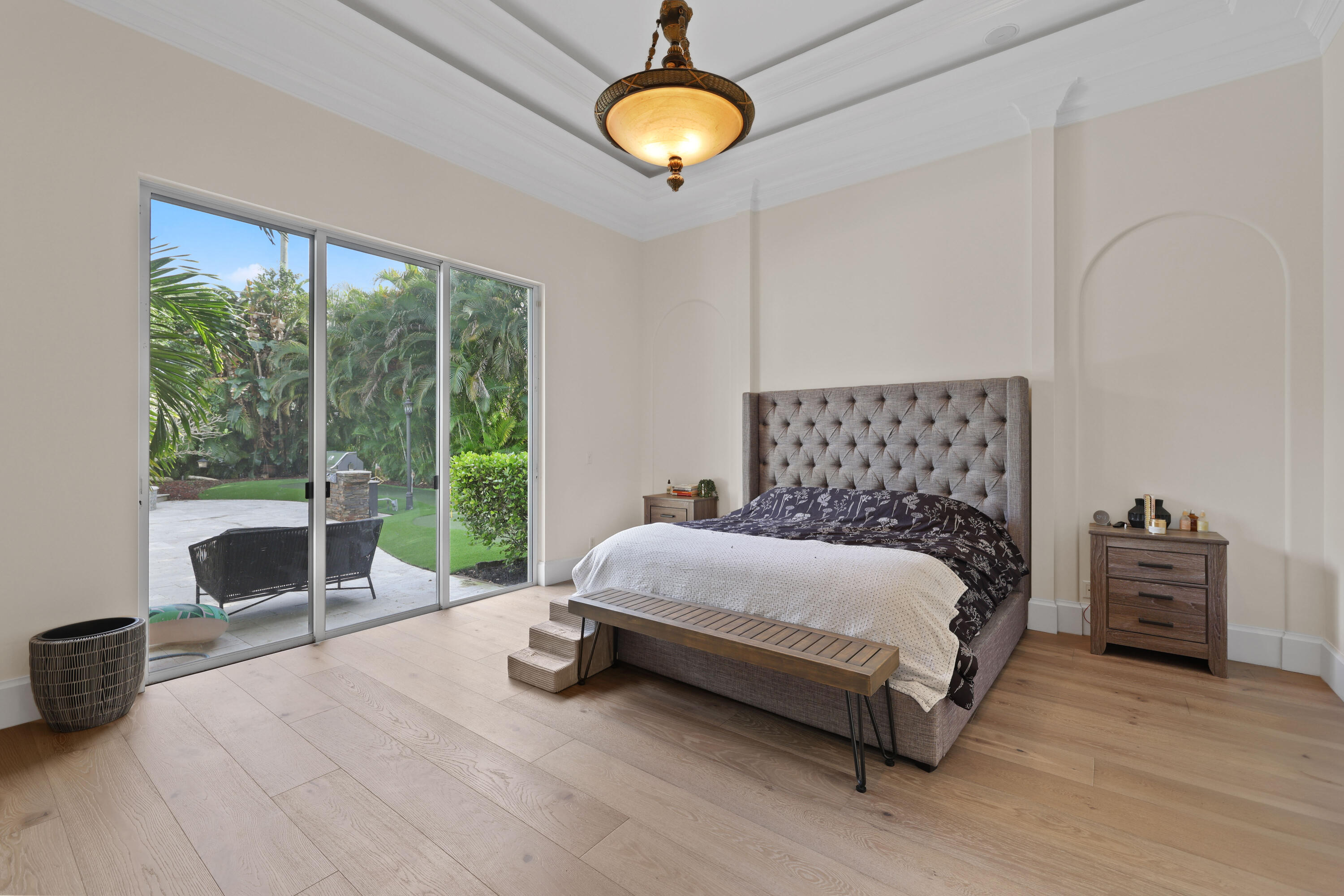 562 Rookery Place Jupiter, FL 33458 - Photo 35 of 72 a spacious bedroom with a bed and a large window