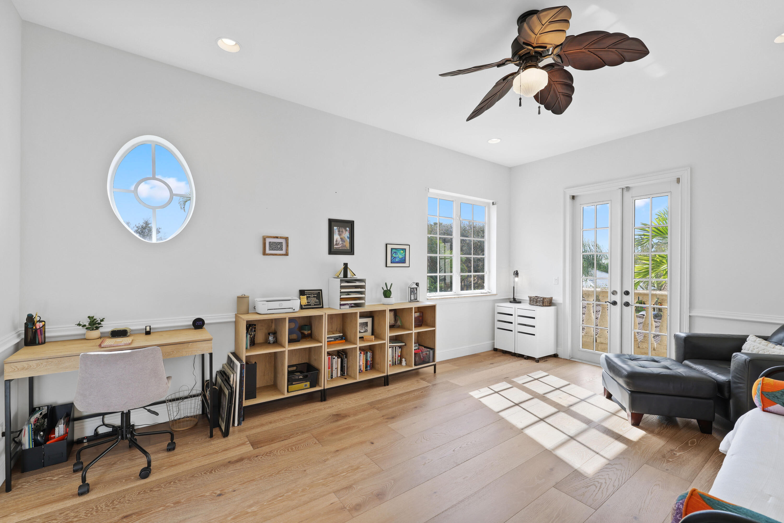 562 Rookery Place Jupiter, FL 33458 - Photo 44 of 72 a living room with furniture and windows