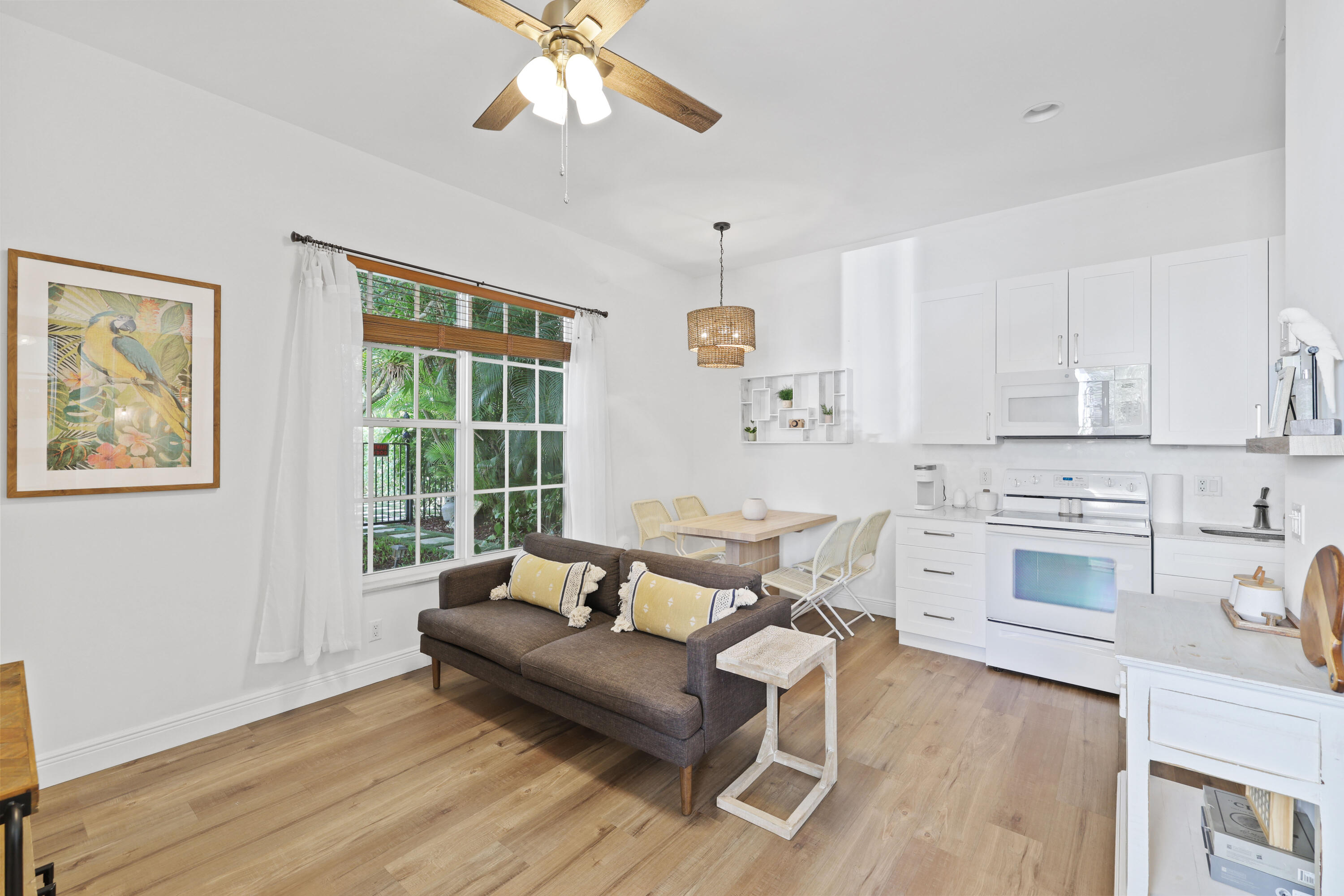 562 Rookery Place Jupiter, FL 33458 - Photo 56 of 72 a living room with furniture and a wooden floor