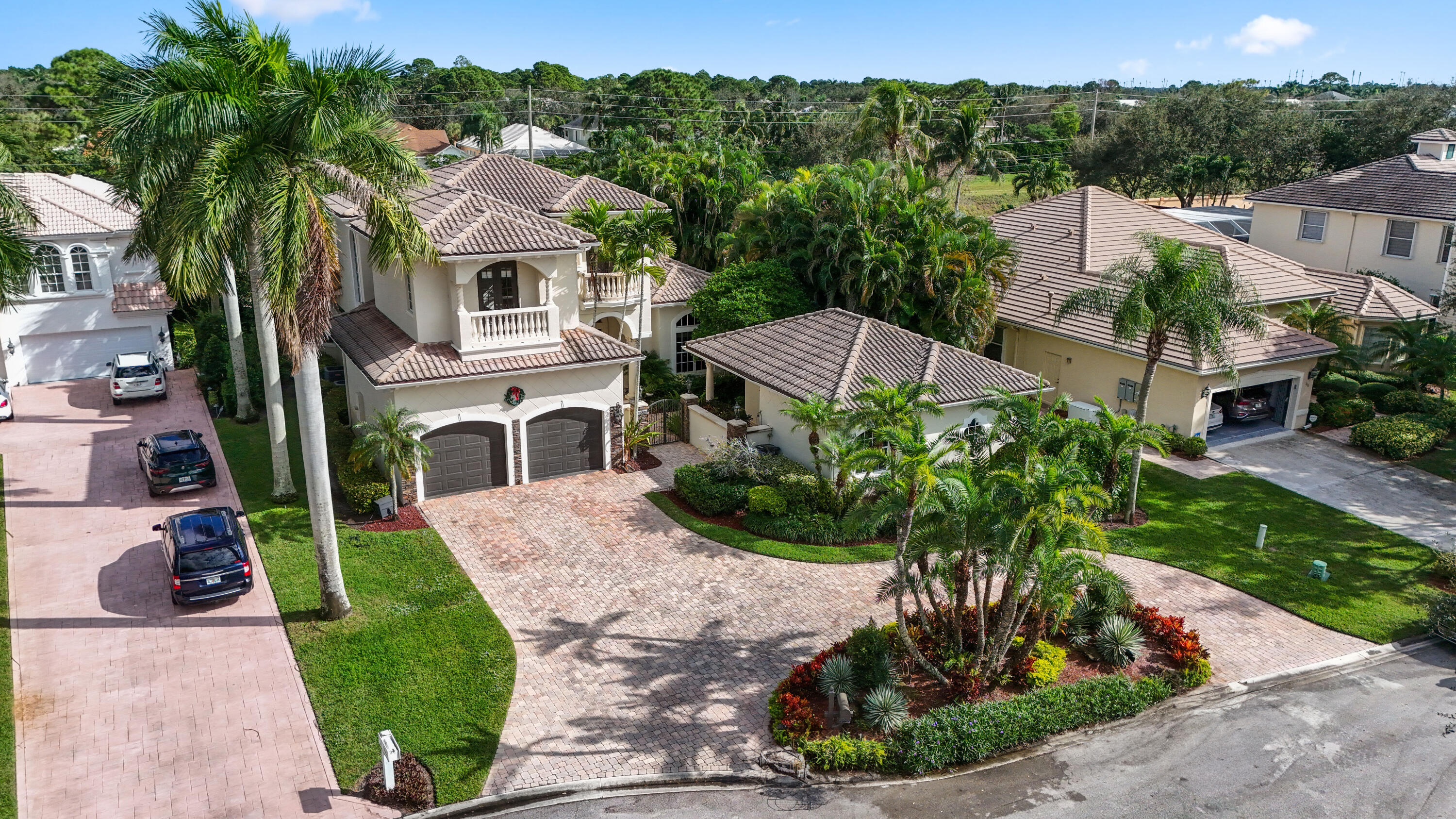 562 Rookery Place Jupiter, FL 33458 - Photo 66 of 72 a aerial view of a house with a yard and potted plants