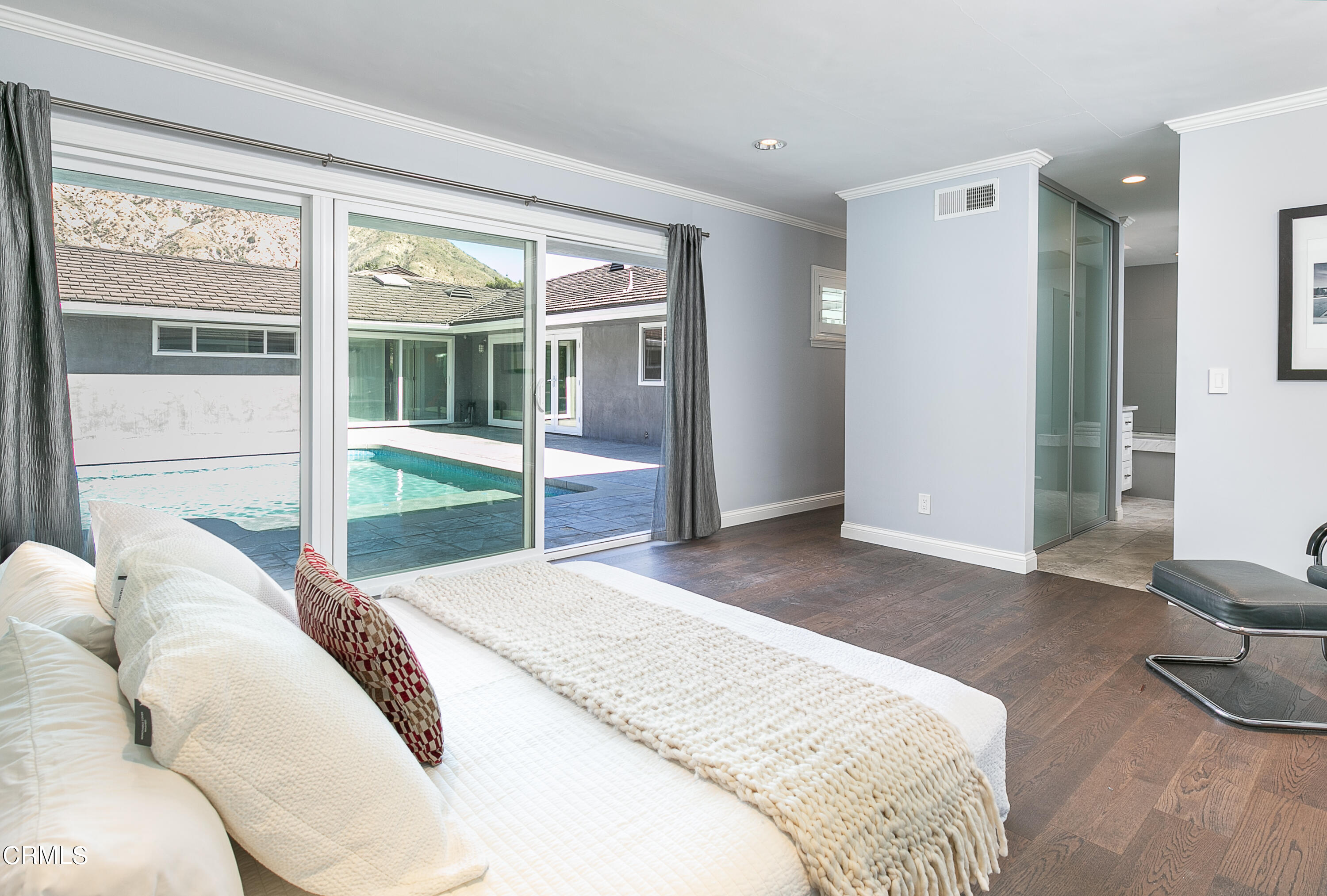 2209 Cielo Place Arcadia, CA 91006 - Photo 20 of 49 a spacious bedroom with a bed and a large window