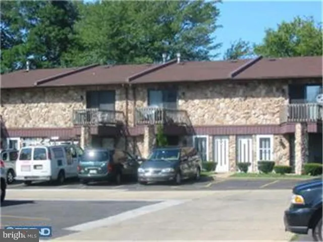 a car parked in front of a building