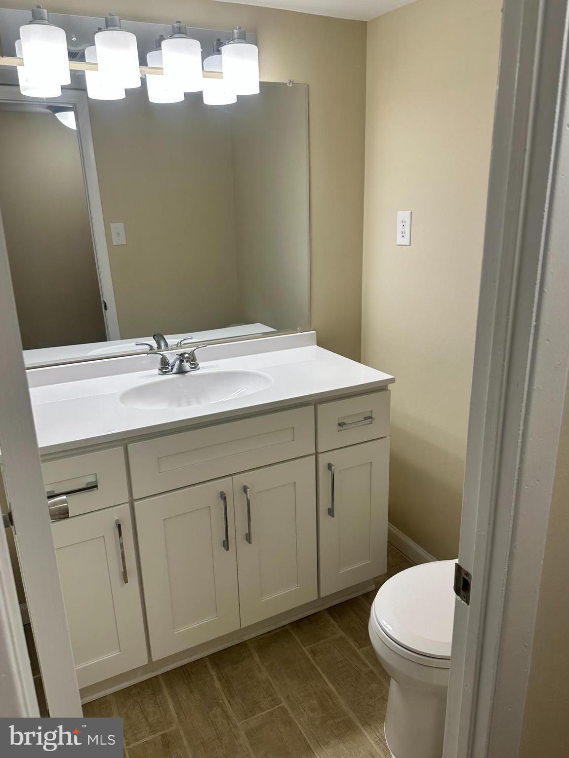 2525 Welsh Road Philadelphia, PA 19114 - Photo 13 of 22 a bathroom with a sink a toilet and mirror