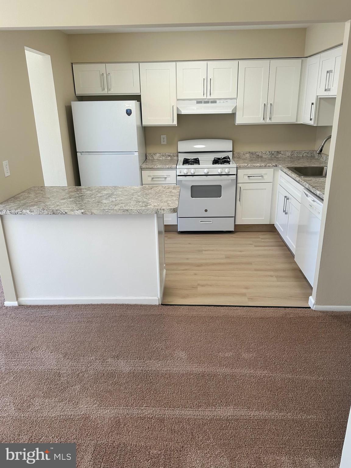2525 Welsh Road Philadelphia, PA 19114 - Photo 8 of 22 a kitchen with stainless steel appliances granite countertop a stove and a sink