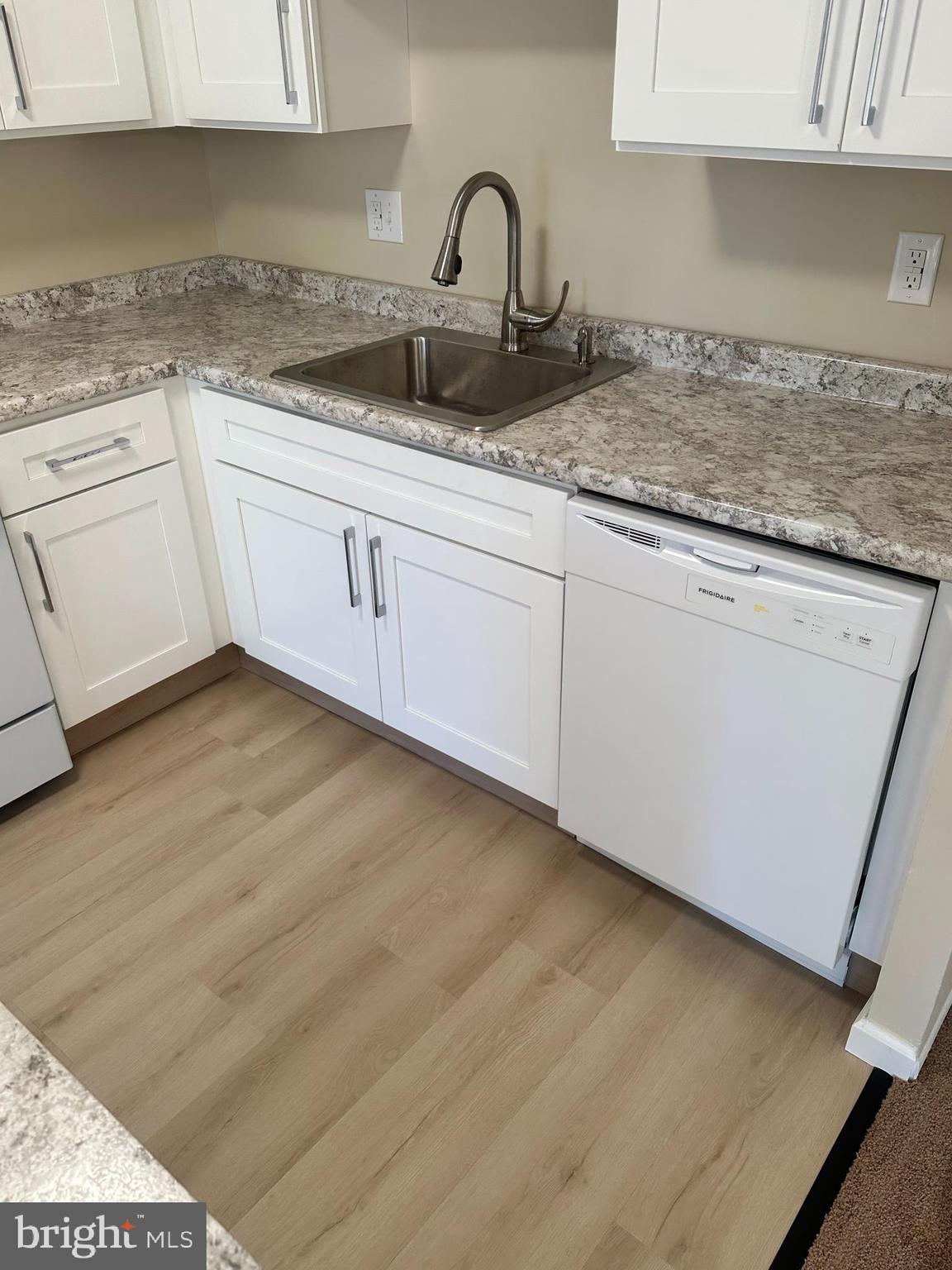 2525 Welsh Road Philadelphia, PA 19114 - Photo 9 of 22 a kitchen with granite countertop white cabinets and a granite counter tops