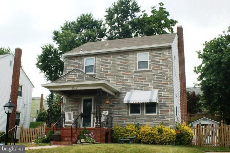 5546 Ashbourne Road Halethorpe, MD 21227 - Photo 1 of 26 a front view of a house with garden