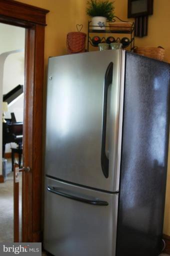 5546 Ashbourne Road Halethorpe, MD 21227 - Photo 8 of 26 a close view of a refrigerator in kitchen