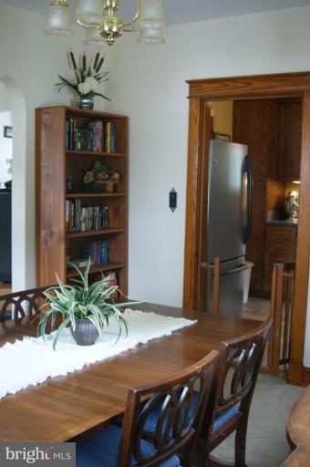 5546 Ashbourne Road Halethorpe, MD 21227 - Photo 9 of 26 a view of a dining room with furniture and wooden floor
