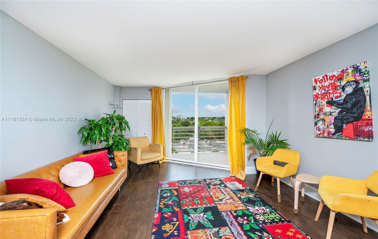 2400 Southwest 3rd Avenue, Unit 802 Miami, FL 33129 - Photo 11 of 26 a living room filled with furniture and a potted plant