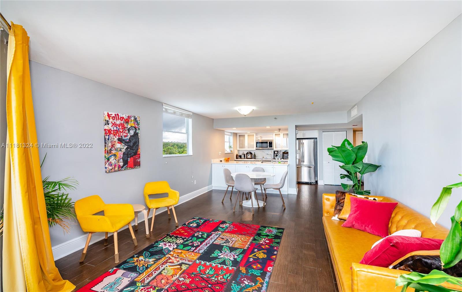 2400 Southwest 3rd Avenue, Unit 802 Miami, FL 33129 - Photo 12 of 26 a living room with furniture fireplace and dining table