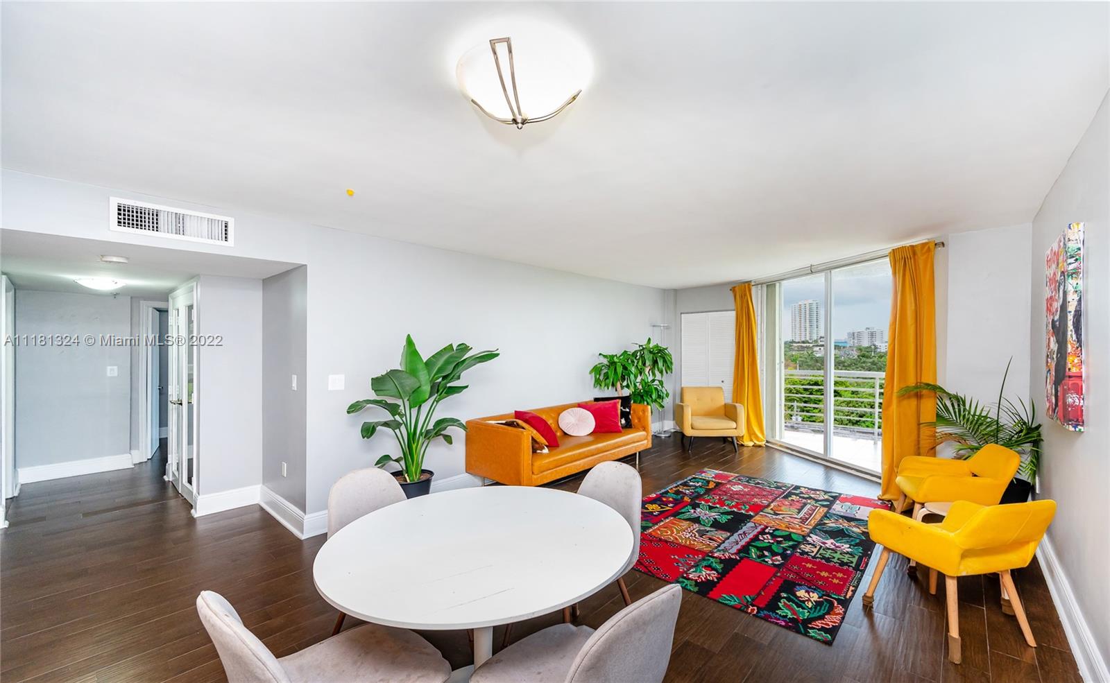 2400 Southwest 3rd Avenue, Unit 802 Miami, FL 33129 - Photo 14 of 26 a living room with furniture and a table
