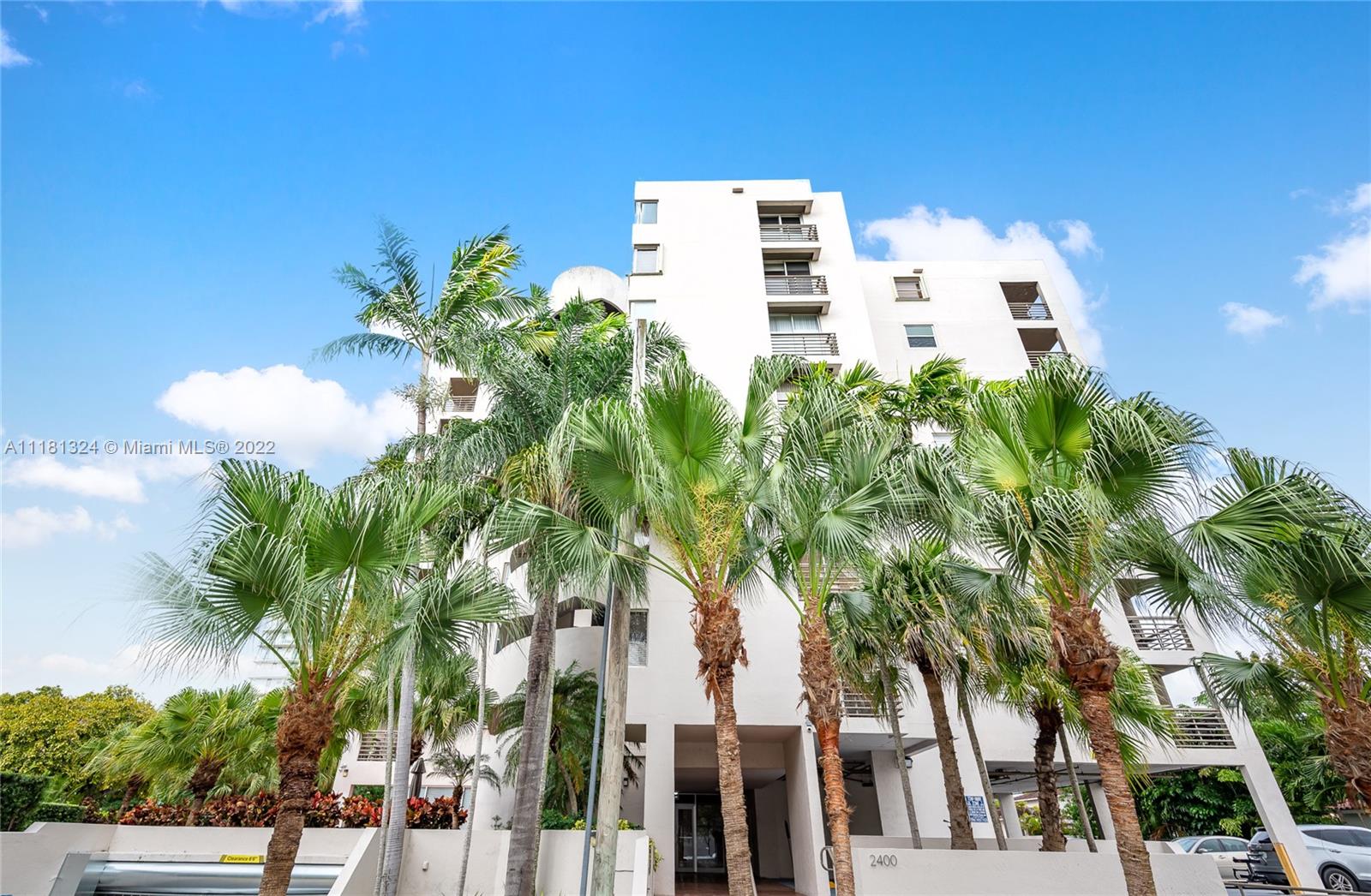 2400 Southwest 3rd Avenue, Unit 802 Miami, FL 33129 - Photo 2 of 26 a building view with a garden space