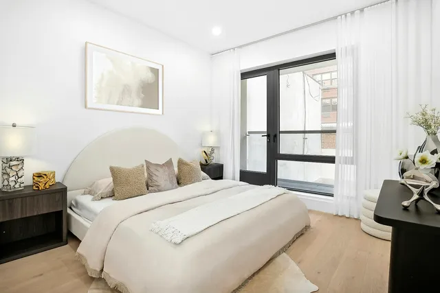 a kitchen with stainless steel appliances granite countertop a stove and a refrigerator