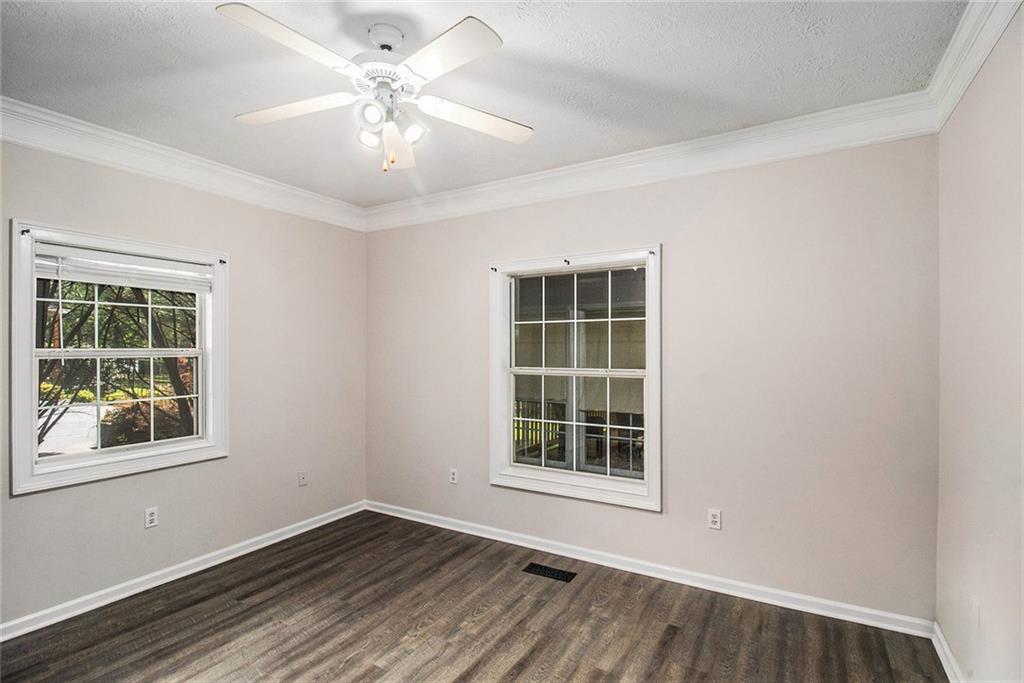 96 Pointe View Court Jackson, GA 30233 - Photo 18 of 36 wooden floor in an empty room with a window