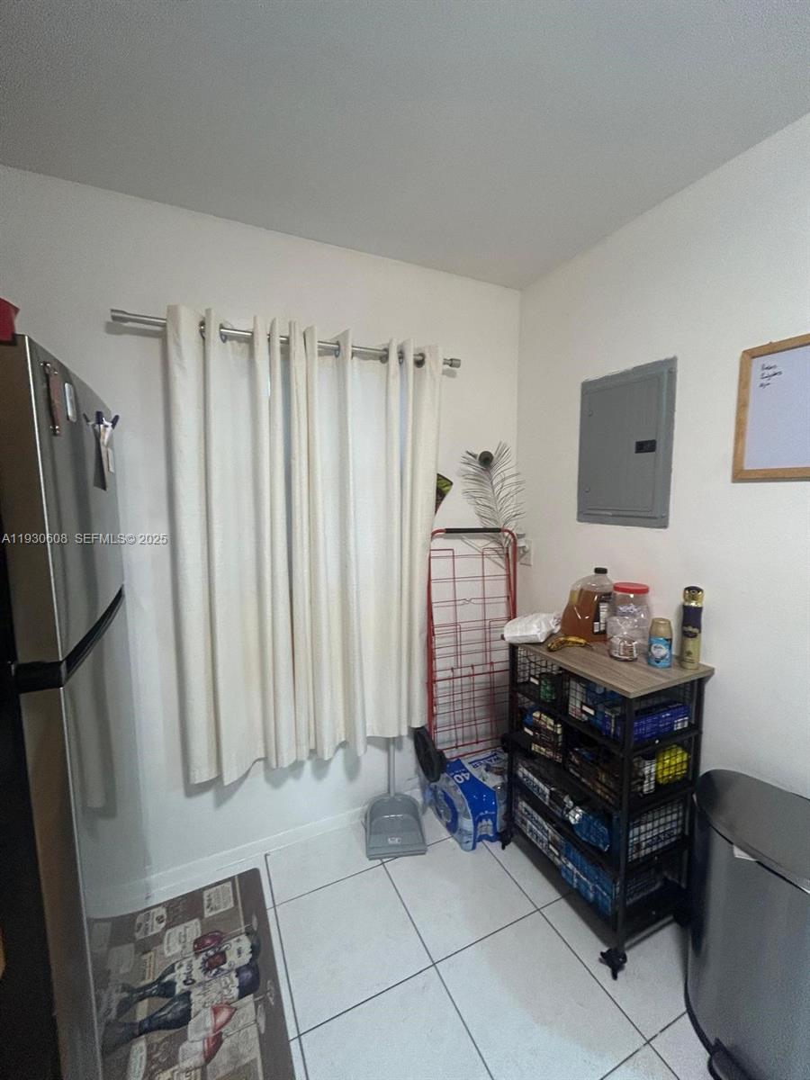 19771 Southwest 114th Avenue, Unit 329 Miami, FL 33157 - Photo 2 of 12 a living room with furniture and a window