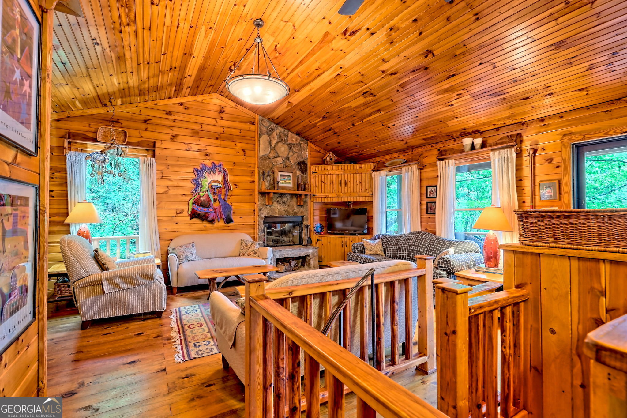3019 Moccasin Creek Road Clarkesville, GA 30523 - Photo 12 of 72 a view of an chairs and tables in the patio