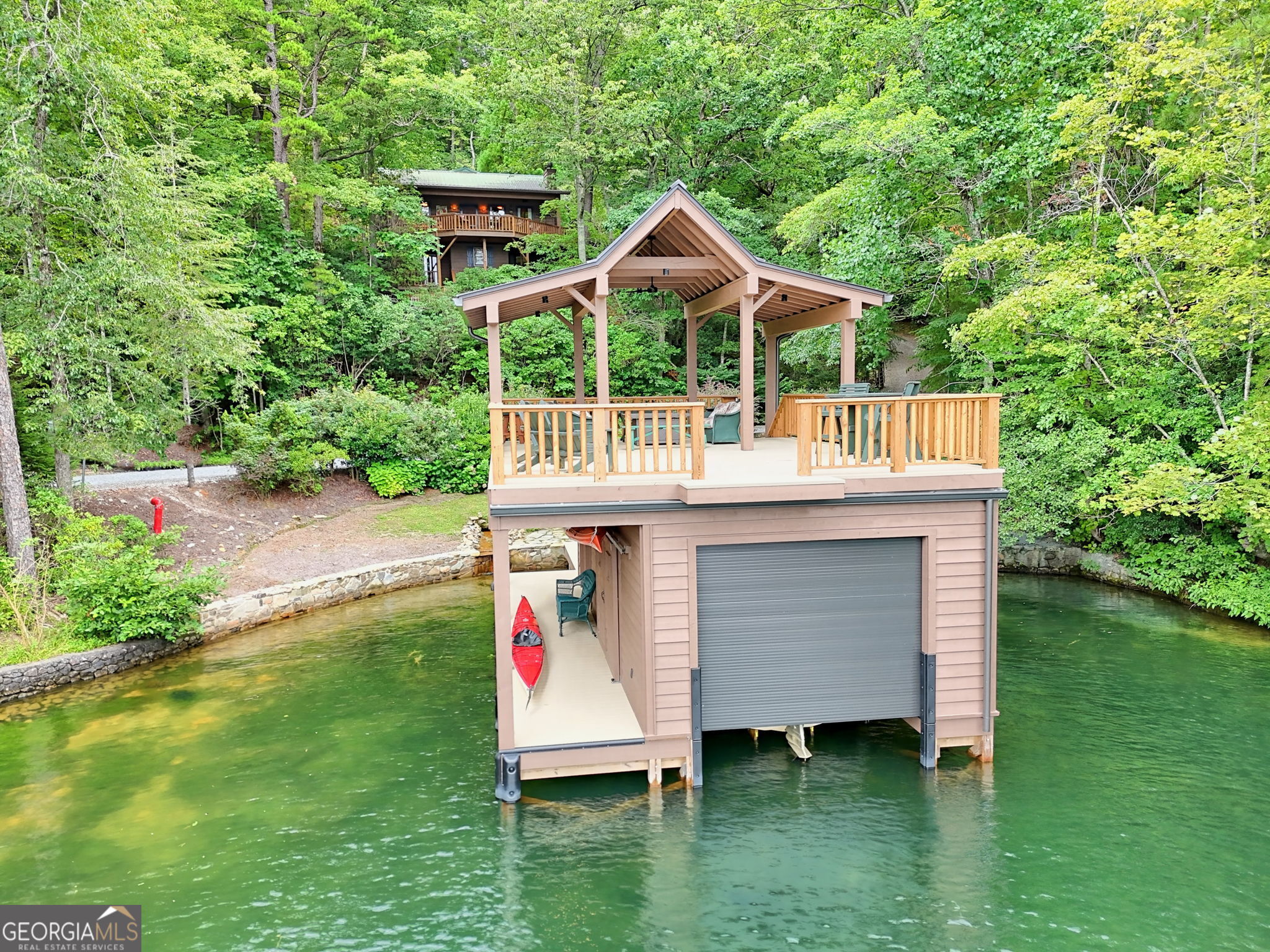 3019 Moccasin Creek Road Clarkesville, GA 30523 - Photo 2 of 72 a view of a house with a yard and sitting area