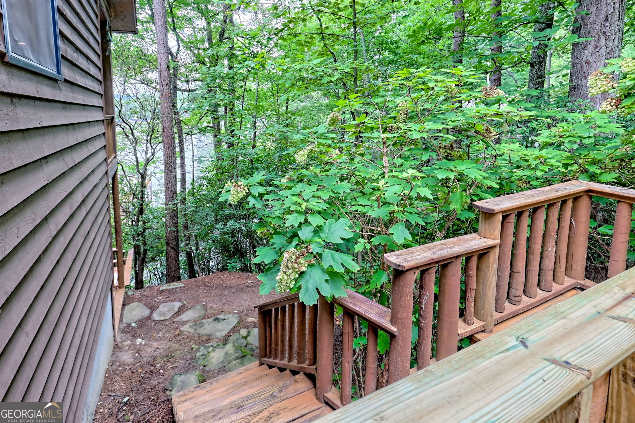 3019 Moccasin Creek Road Clarkesville, GA 30523 - Photo 26 of 72 a view of balcony with wooden floor and fence