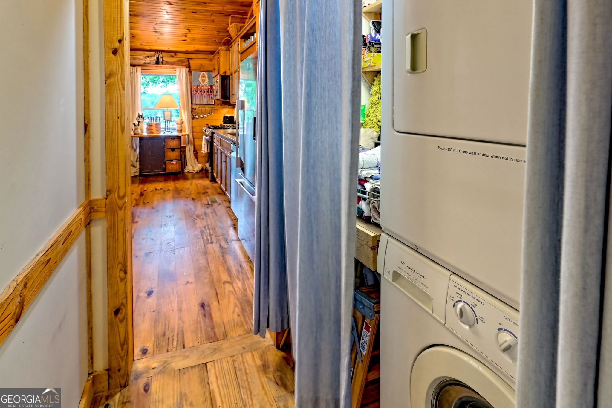 3019 Moccasin Creek Road Clarkesville, GA 30523 - Photo 29 of 72 a view of walk in closet with clothes and shoes