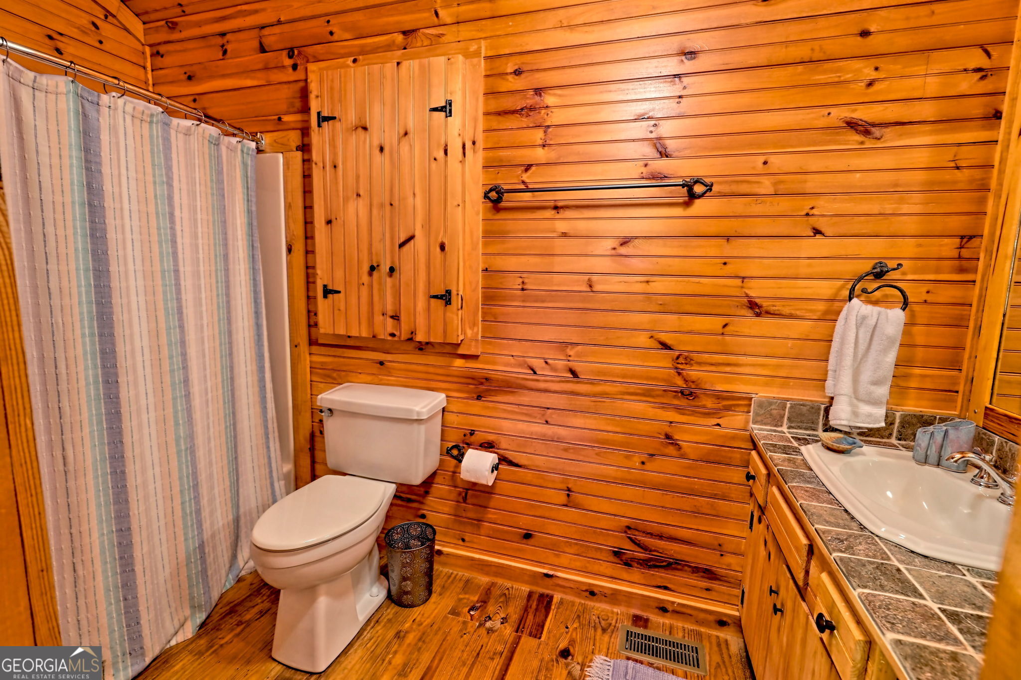 3019 Moccasin Creek Road Clarkesville, GA 30523 - Photo 31 of 72 a bathroom with a sink and a toilet