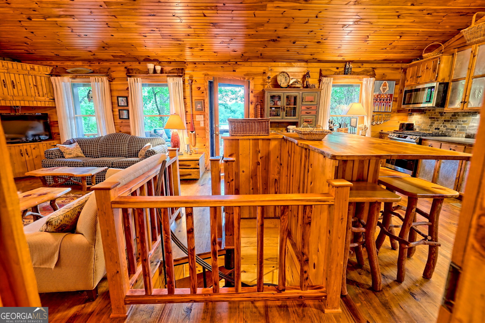 3019 Moccasin Creek Road Clarkesville, GA 30523 - Photo 32 of 72 a view of a living room and hall with furniture