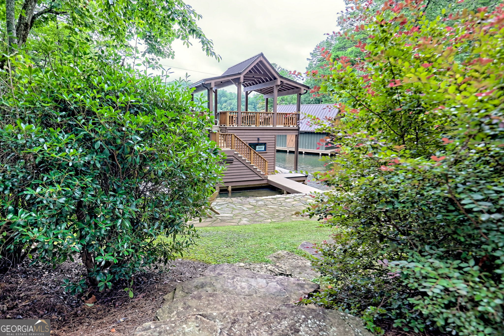 3019 Moccasin Creek Road Clarkesville, GA 30523 - Photo 55 of 72 a view of a back yard of the house