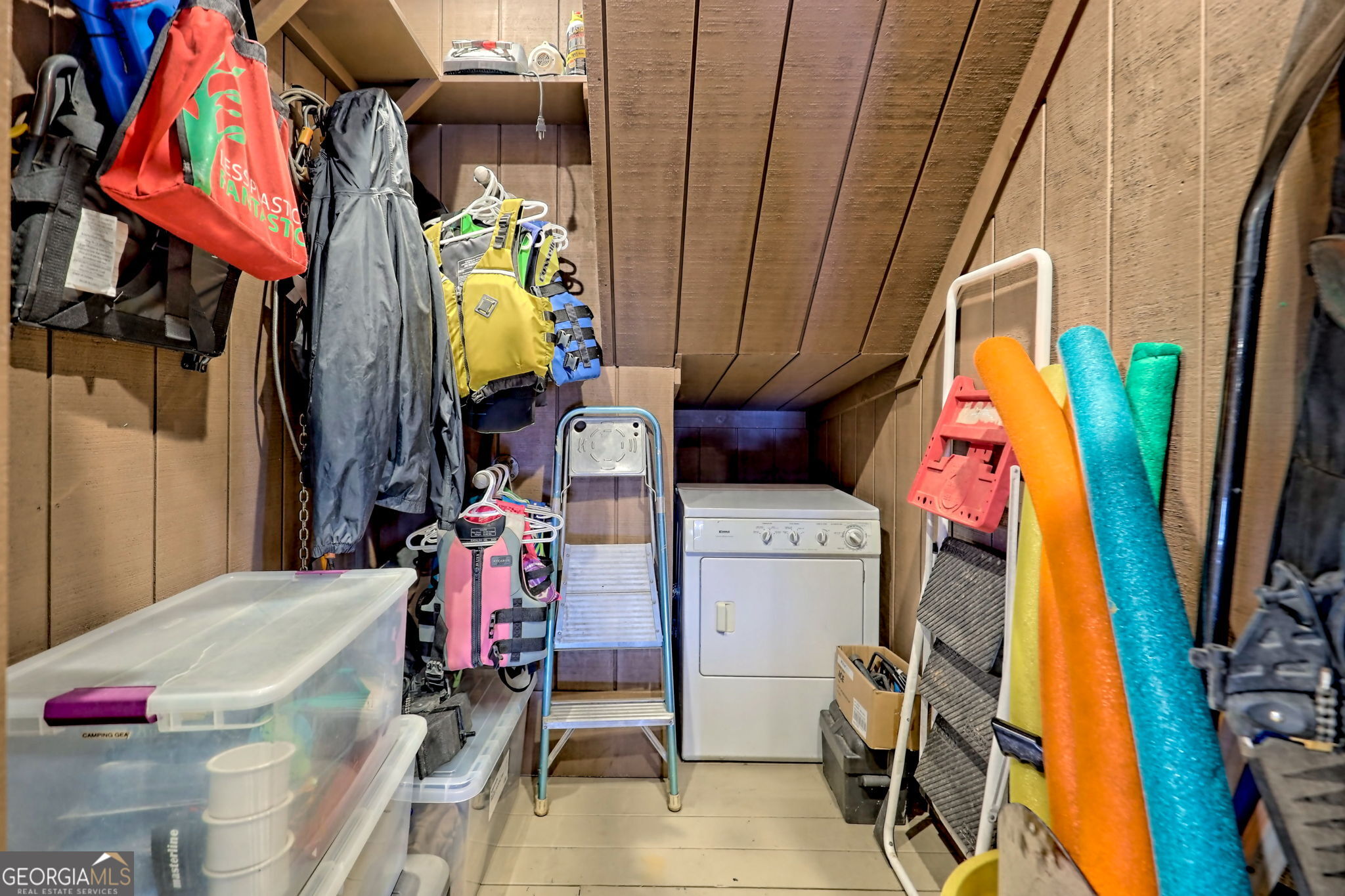 3019 Moccasin Creek Road Clarkesville, GA 30523 - Photo 60 of 72 a view of walk in closet with clothes and shoes