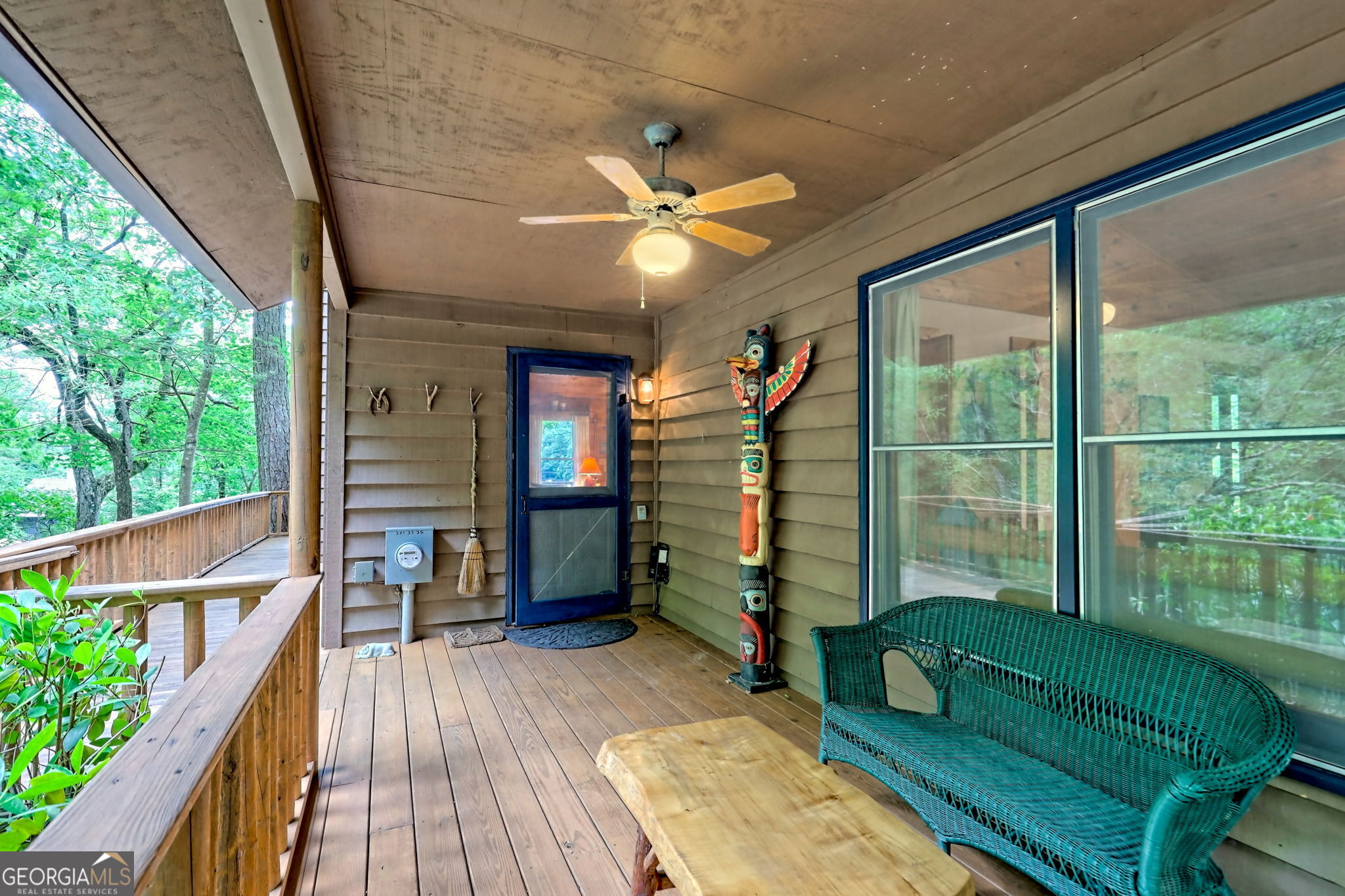 3019 Moccasin Creek Road Clarkesville, GA 30523 - Photo 9 of 72 a view of a porch with furniture