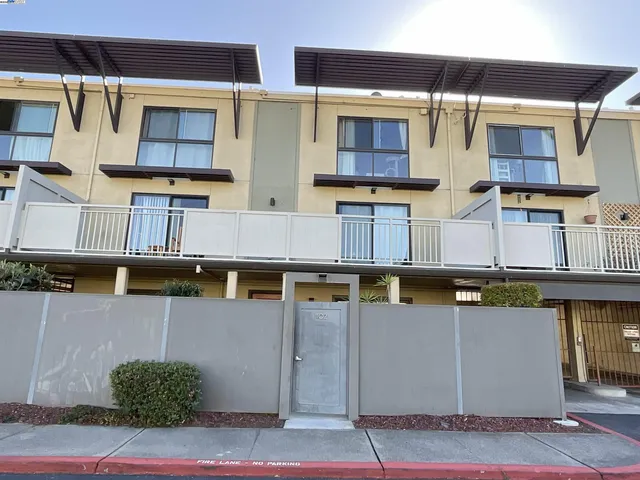 a view of a street with buildings