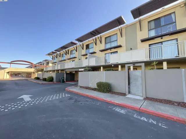 a front view of a building with retail street