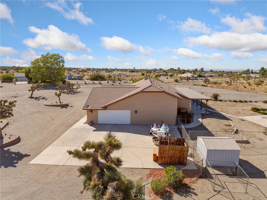 11025 El Esteban Road Phelan, CA 92371 - Photo 49 of 54 a view of a terrace with furniture and a table